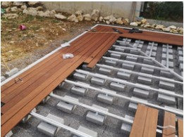 Aluminium Unterkonstruktion verlegt mit Bambus-Terrassendielen auf Betonsteine
